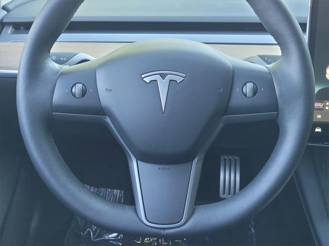 Photo of 2022 Pearl White Multi-Coat Tesla Model 3
