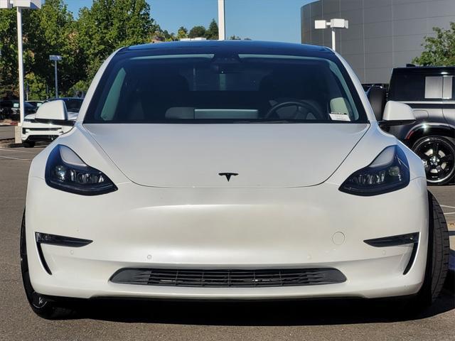 Photo of 2022 Pearl White Multi-Coat Tesla Model 3