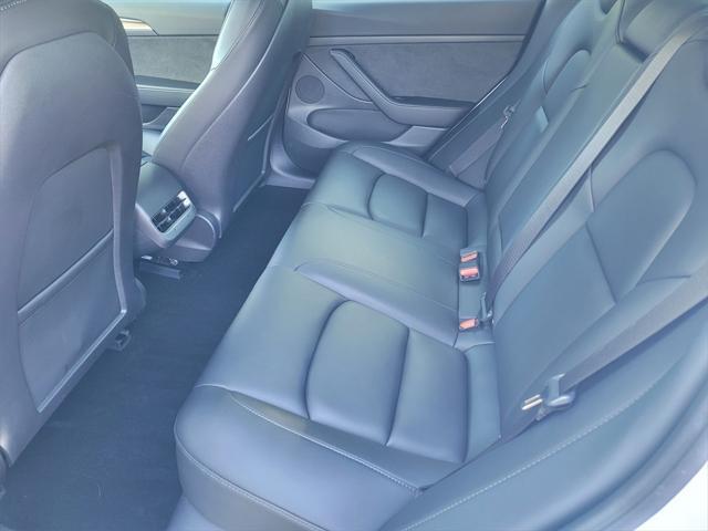 Photo of 2022 Pearl White Multi-Coat Tesla Model 3