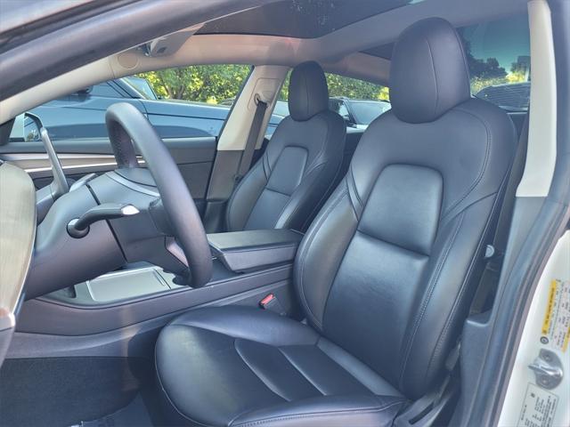 Photo of 2022 Pearl White Multi-Coat Tesla Model 3