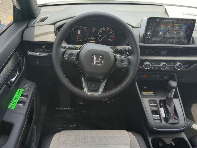 Photo of 2025 Platinum White Pearl Honda CR-V Hybrid