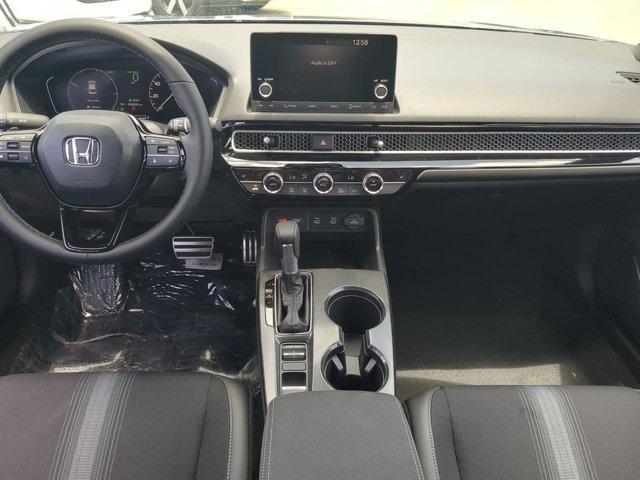 Photo of 2026 Blue Lagoon Honda Civic Hybrid
