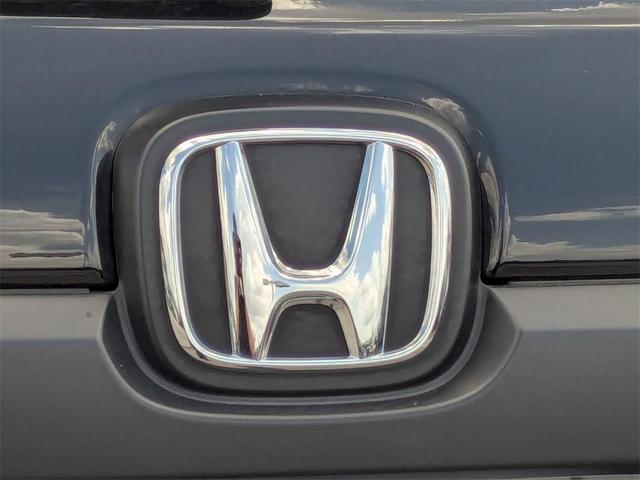 Photo of 2023 Crystal Black Pearl Honda Passport