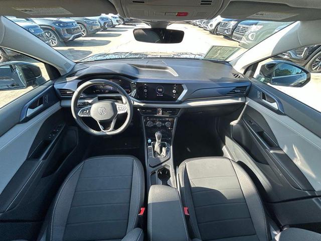 Photo of 2024 Deep Black Pearl Volkswagen Taos