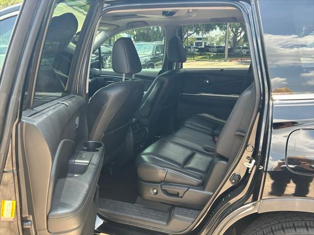 Photo of 2019 Black Metallic Honda Pilot