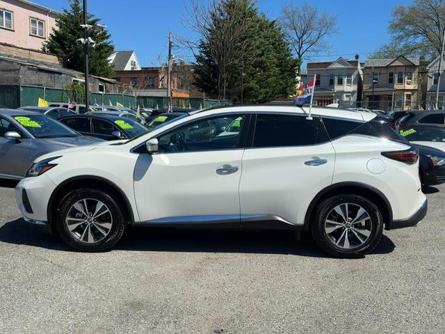 Photo of 2024 Pearl White Tricoat Nissan Murano