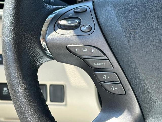 Photo of 2024 Pearl White Tricoat Nissan Murano