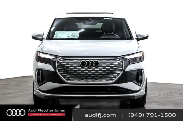 Photo of 2025 Glacier White Metallic Audi Q4 e-tron Sportback