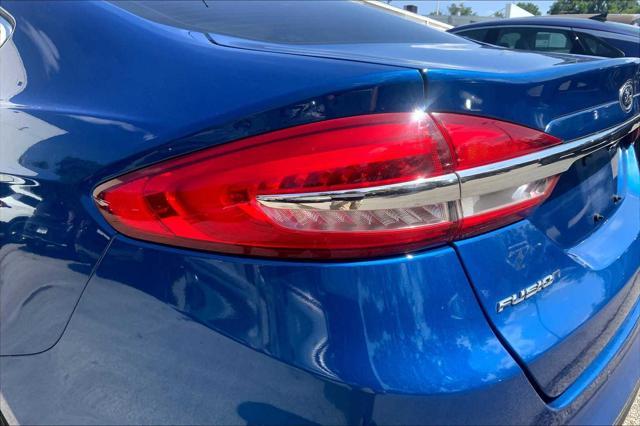 Photo of 2017 BLUE LIGHTNING Ford Fusion