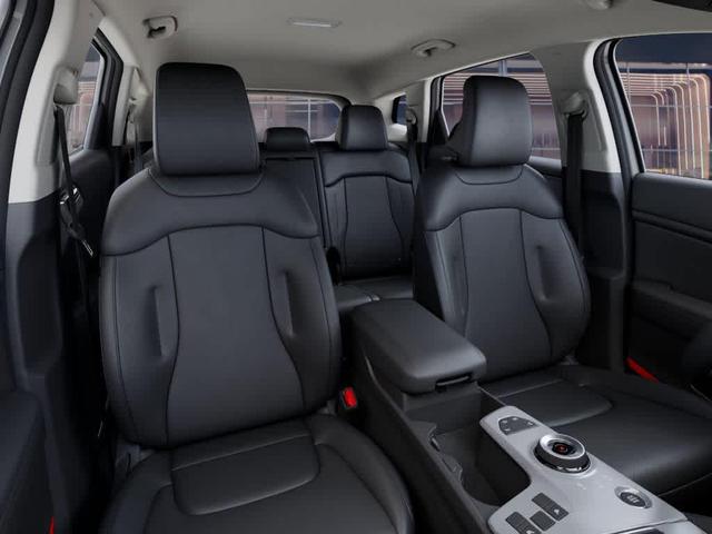 Photo of 2026 Wolf Gray Kia Sportage Hybrid