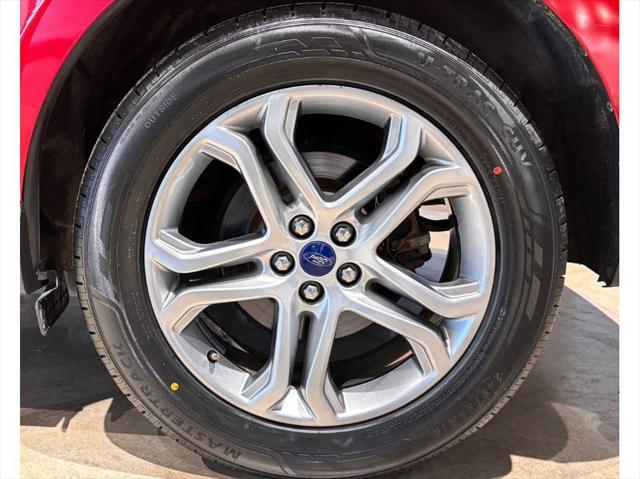 Photo of 2017 Ruby Red Metallic Tinted Clearcoat Ford Edge
