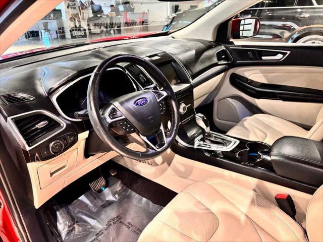 Photo of 2017 Ruby Red Metallic Tinted Clearcoat Ford Edge