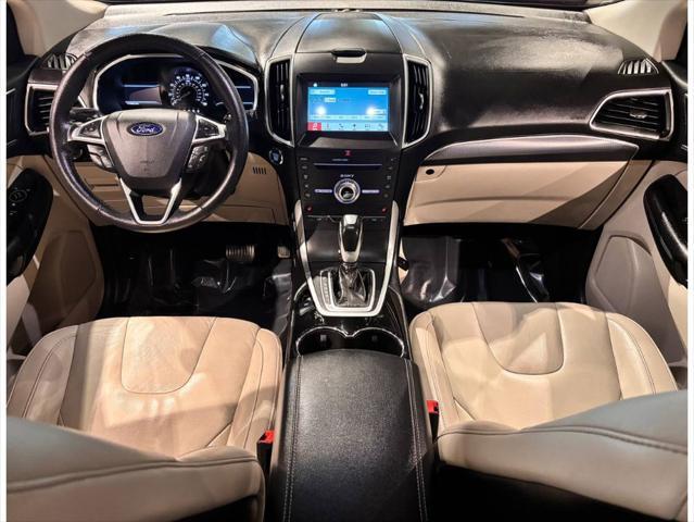 Photo of 2017 Ruby Red Metallic Tinted Clearcoat Ford Edge