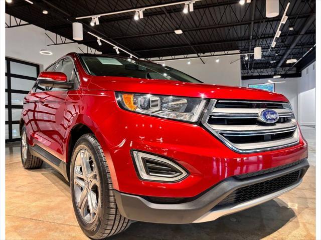 Photo of 2017 Ruby Red Metallic Tinted Clearcoat Ford Edge
