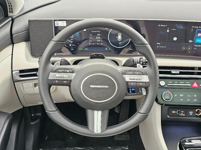 Photo of 2025 White Pearl Hyundai TUCSON Hybrid