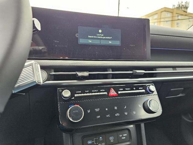 Photo of 2025 Red Hyundai TUCSON Hybrid