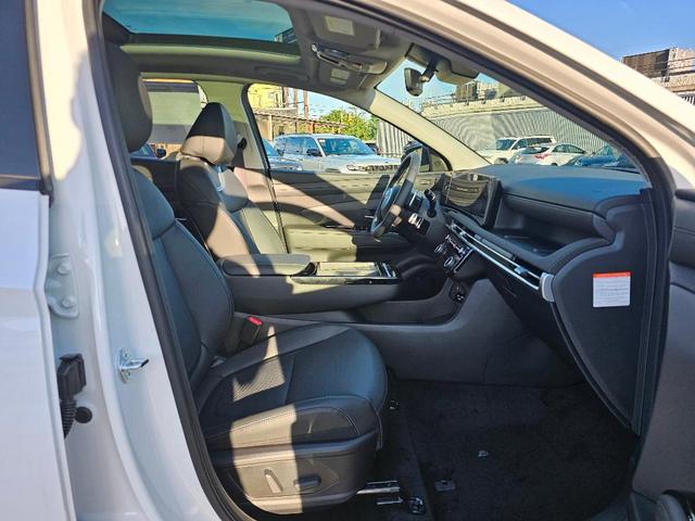 Photo of 2025 White Pearl Hyundai TUCSON Hybrid