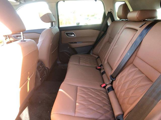 Photo of 2025 Scarlet Ember Tintcoat Nissan Rogue
