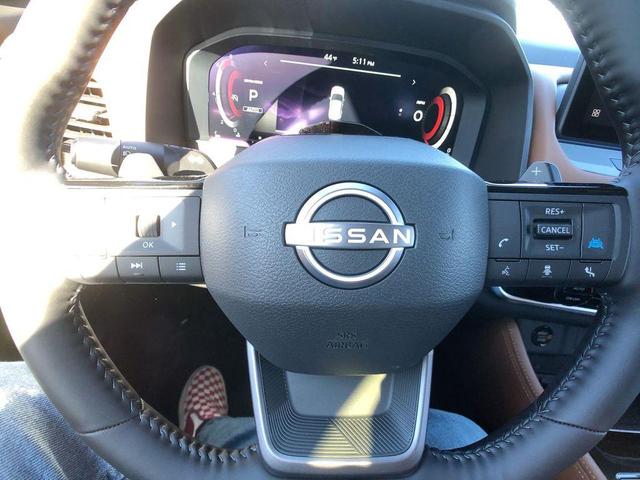 Photo of 2025 Scarlet Ember Tintcoat Nissan Rogue