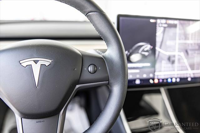 Photo of 2020 Pearl White Multi-Coat Tesla Model 3