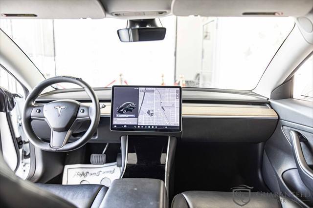 Photo of 2020 Pearl White Multi-Coat Tesla Model 3