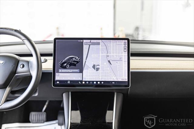 Photo of 2020 Pearl White Multi-Coat Tesla Model 3