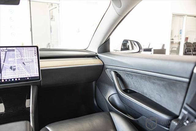 Photo of 2020 Pearl White Multi-Coat Tesla Model 3