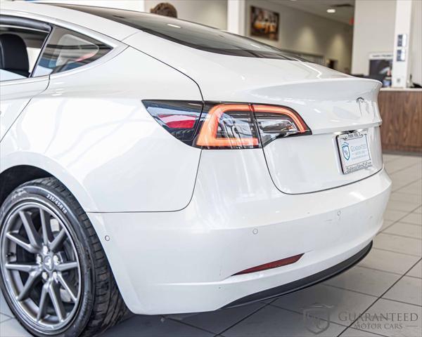 Photo of 2020 Pearl White Multi-Coat Tesla Model 3