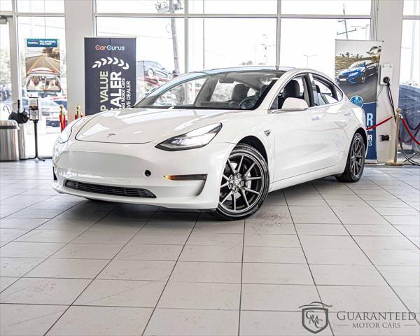 Photo of 2020 Pearl White Multi-Coat Tesla Model 3