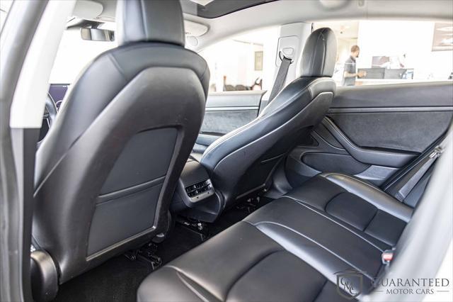 Photo of 2020 Pearl White Multi-Coat Tesla Model 3