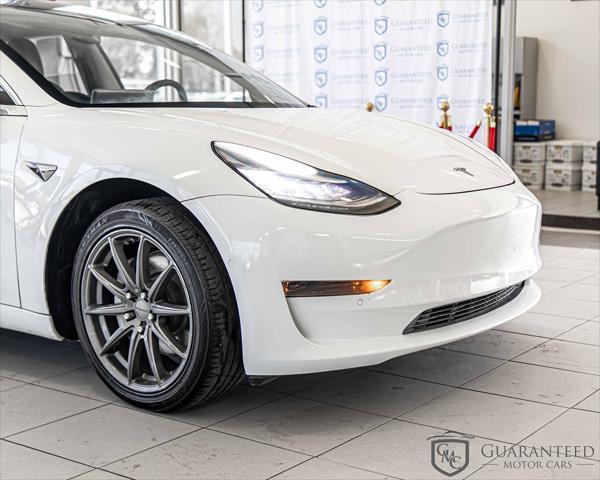 Photo of 2020 Pearl White Multi-Coat Tesla Model 3