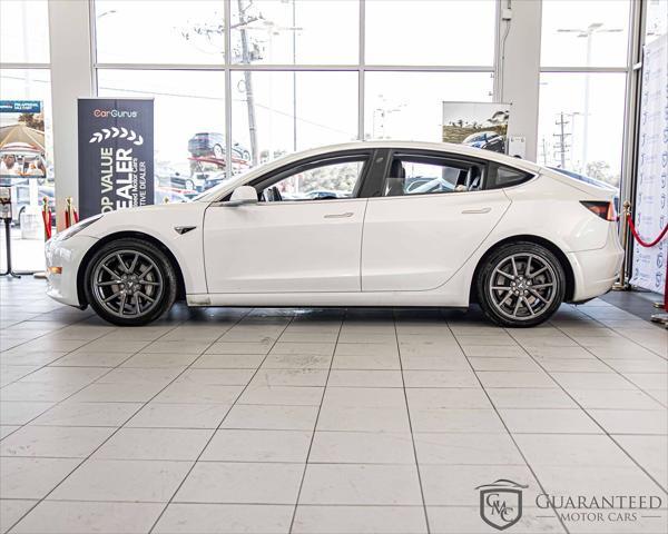 Photo of 2020 Pearl White Multi-Coat Tesla Model 3