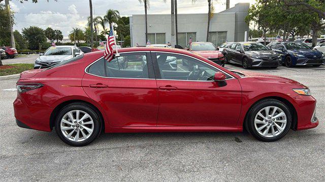 Photo of 2023 Supersonic Red Toyota Camry