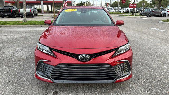 Photo of 2023 Supersonic Red Toyota Camry