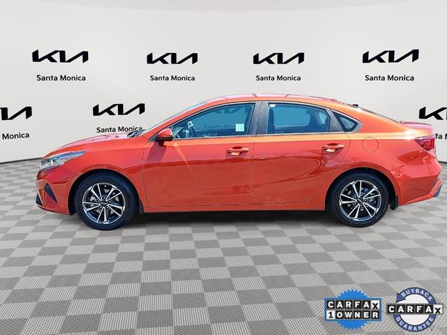 Photo of 2022 Fire Orange Kia Forte
