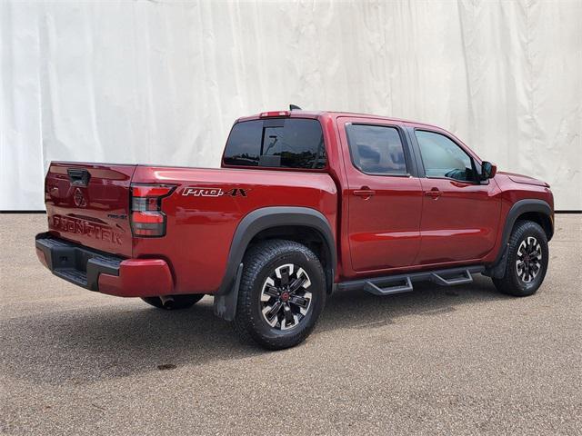 Photo of 2024 Cardinal Red Metallic Tricoat Nissan Frontier