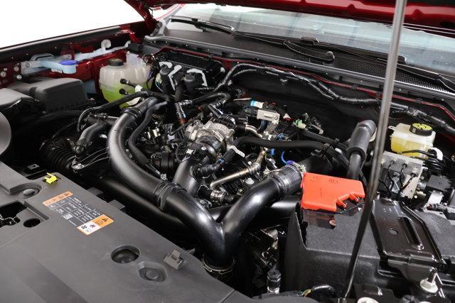 Photo of 2025 Ruby Red Metallic Tinted Clearcoat Ford Ranger