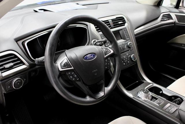 Photo of 2018 White Gold Metallic Ford Fusion Hybrid
