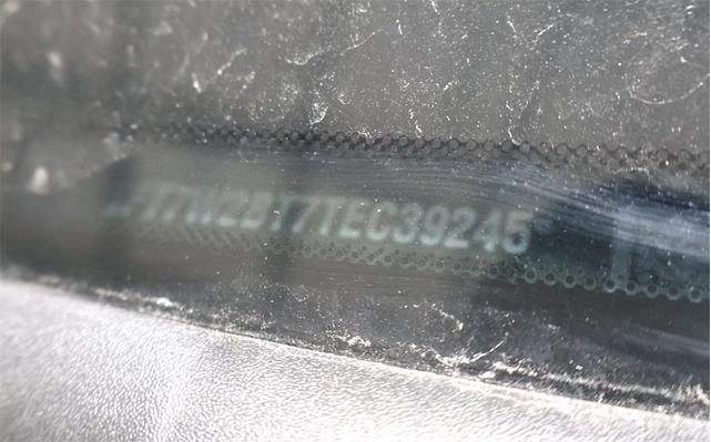 Photo of 2026 Laser Red Tinted Clearcoat Ford F-250