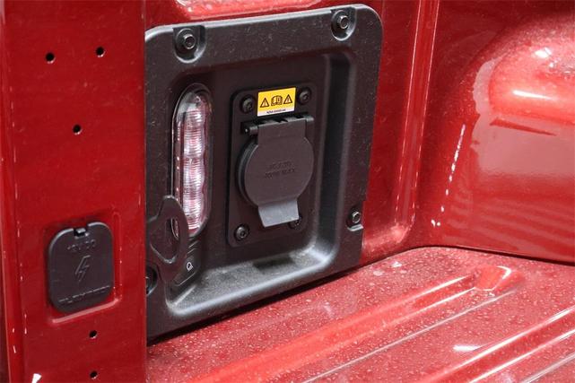 Photo of 2025 Ruby Red Metallic Tinted Clearcoat Ford Maverick