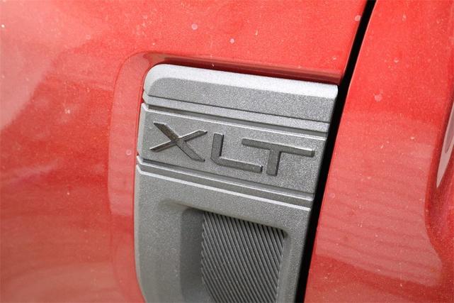 Photo of 2025 Ruby Red Metallic Tinted Clearcoat Ford Maverick