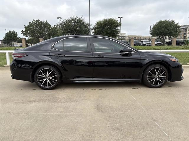 Photo of 2024 Midnight Black Metallic Toyota Camry