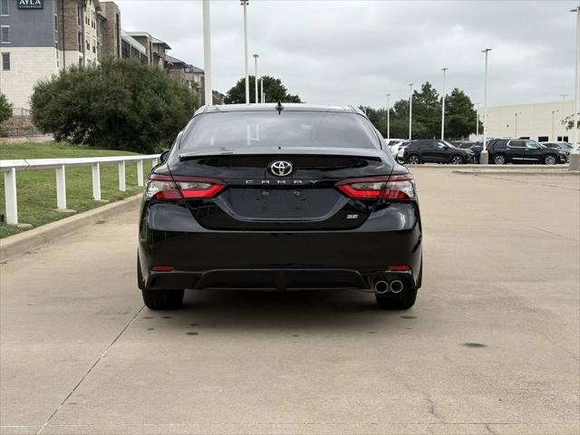 Photo of 2024 Midnight Black Metallic Toyota Camry