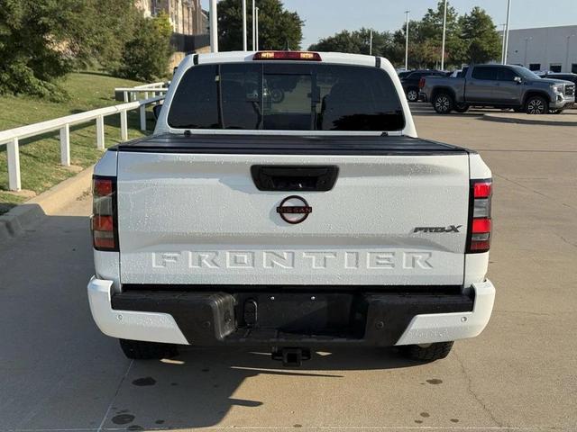 Photo of 2023 Glacier White Nissan Frontier