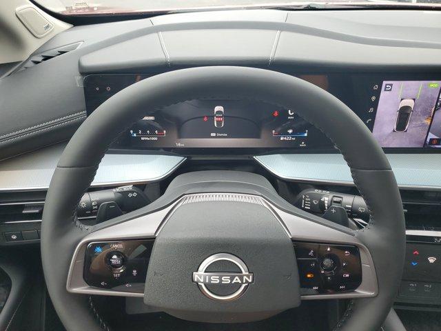 Photo of 2025 2t Red Blk Roof Nissan Murano