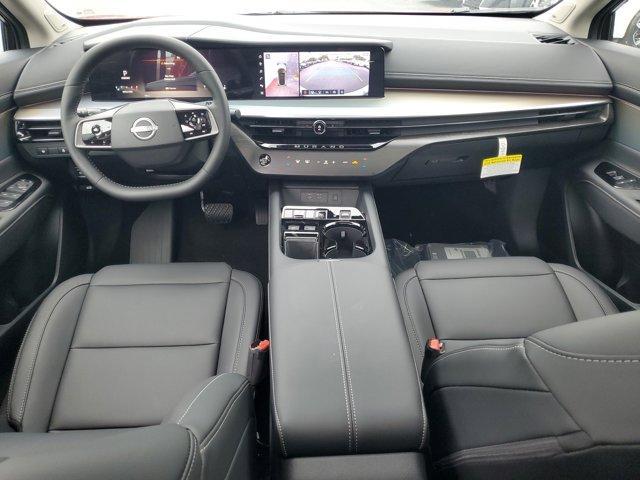 Photo of 2025 2t Red Blk Roof Nissan Murano