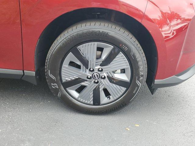 Photo of 2025 2t Red Blk Roof Nissan Murano