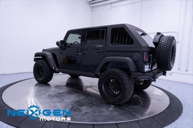Photo of 2011 Black Clearcoat Jeep Wrangler Unlimited