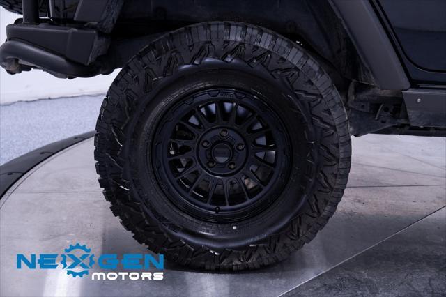 Photo of 2011 Black Clearcoat Jeep Wrangler Unlimited