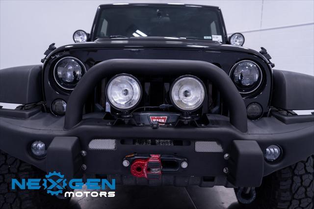 Photo of 2011 Black Clearcoat Jeep Wrangler Unlimited